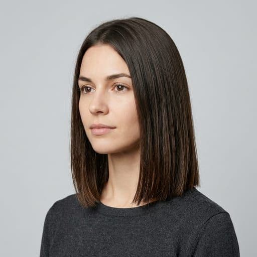 A woman with blunt lob: A long bob cut to one length, ending somewhere between the jaw and the collarbone.