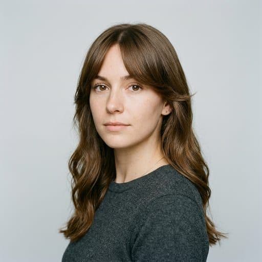 A woman with curtain bangs